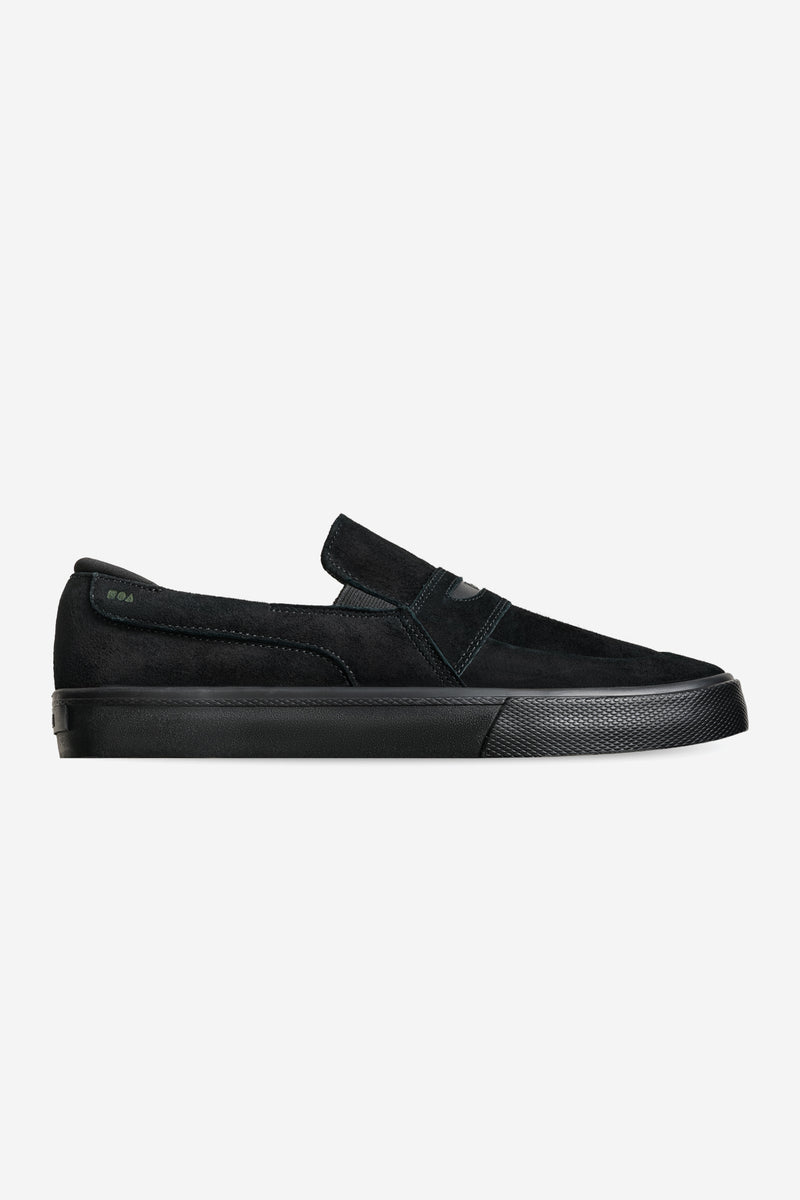 Liaizon black suede slip-on skate shoe side view with strap and rubber sole