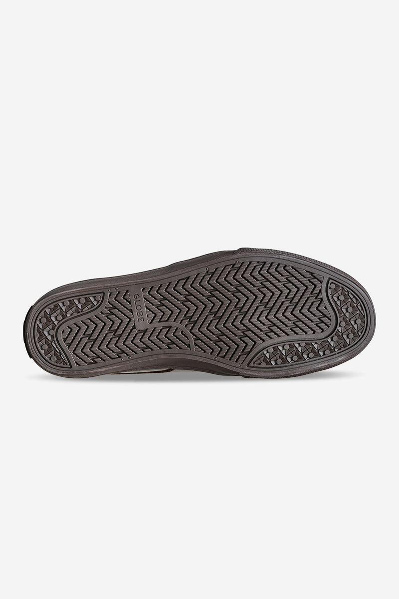 Bottom view of a dark brown skate shoe sole with herringbone tread and Globe logo