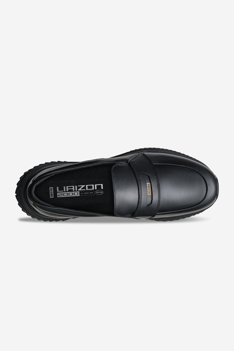 Top-down view of black Liaizon Vibram loafer highlighting the vamp strap and smooth leather upper