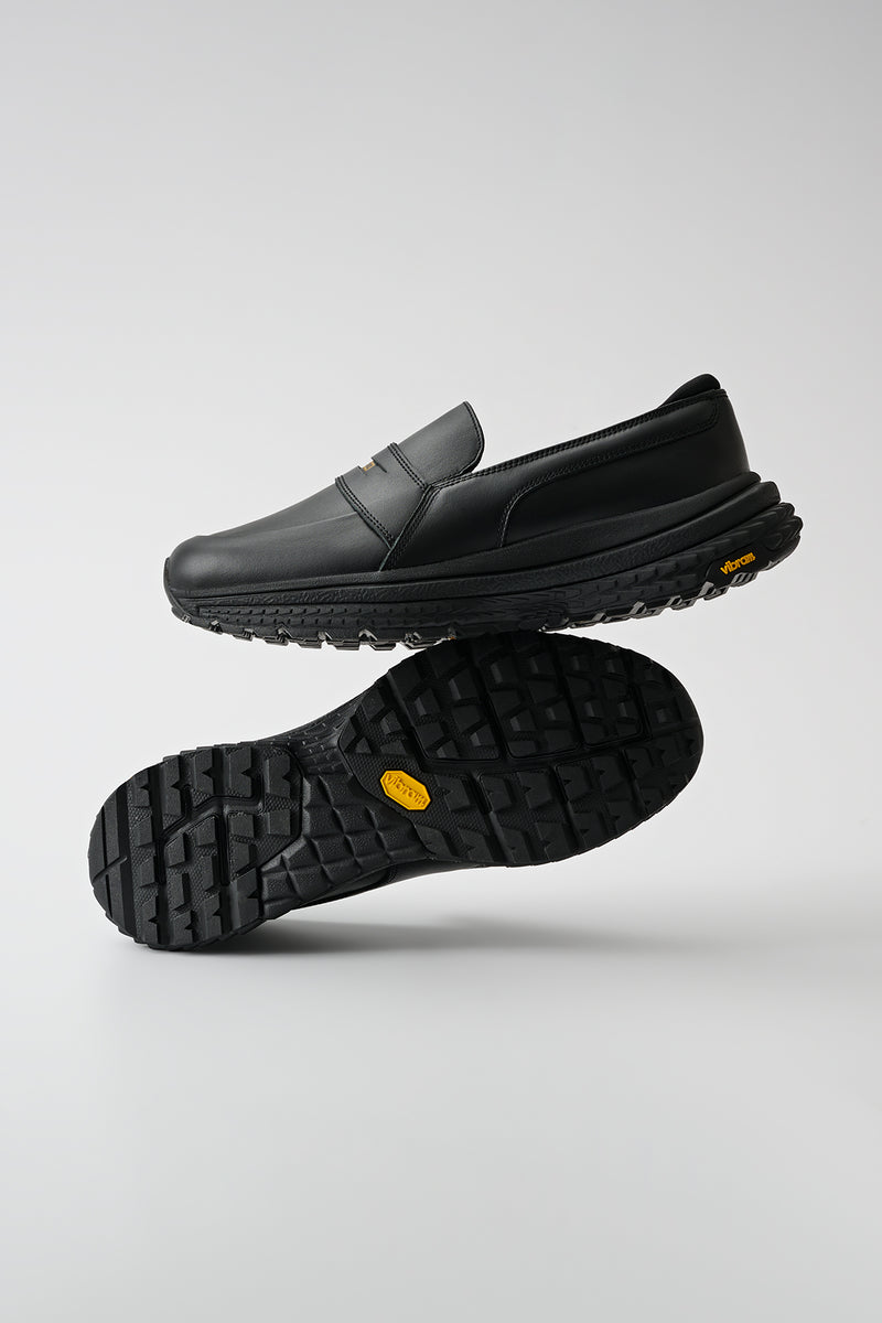 Liaizon Vibram black full grain leather loafer on a rugged Vibram Varanasi sole, side view