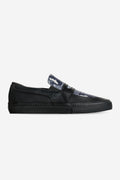 Side view of Liaizon Wasted Talent Black Snake skate loafer with black vulcanized sole and snake pattern vamp