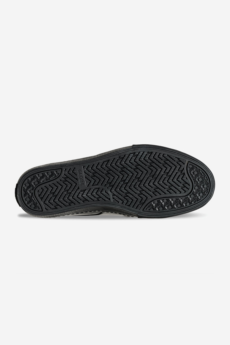 Bottom view of Liaizon Wasted Talent Black Snake outsole with herringbone tread and Globe branding