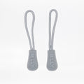 Two light grey zipper pulls with BILLY brand logo on a white background
