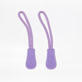 Two purple zipper pulls with 'BILLY' branding on a white background