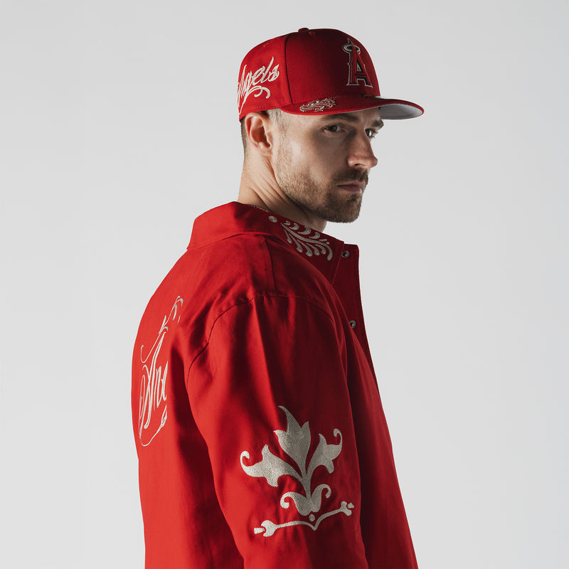 Men's red Angels logo jacket with white ornate embroidery on sleeve