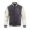 Men's washed-black varsity jacket with LA logo patch and snap front buttons