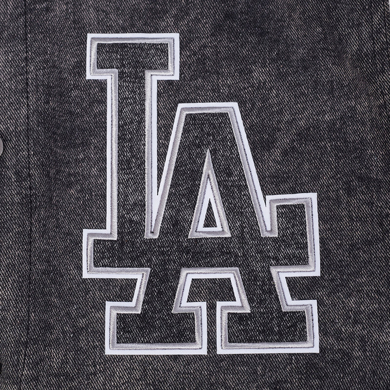 Embroidered 'LA' letter patch in white outline on dark washed varsity jacket