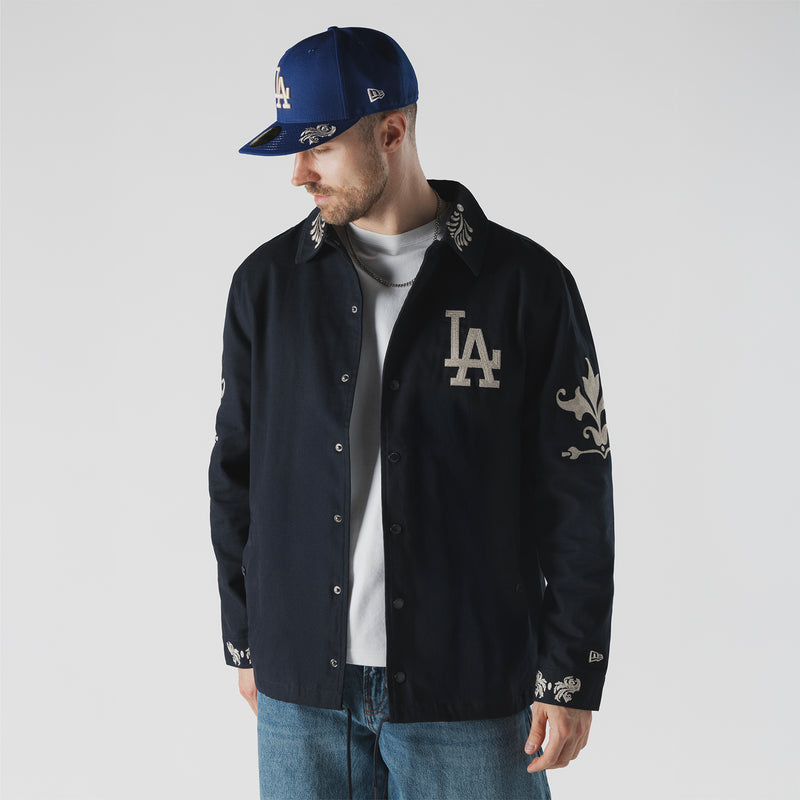 Men's dark navy button-up jacket with LA logo on chest and graphic sleeve embroidery