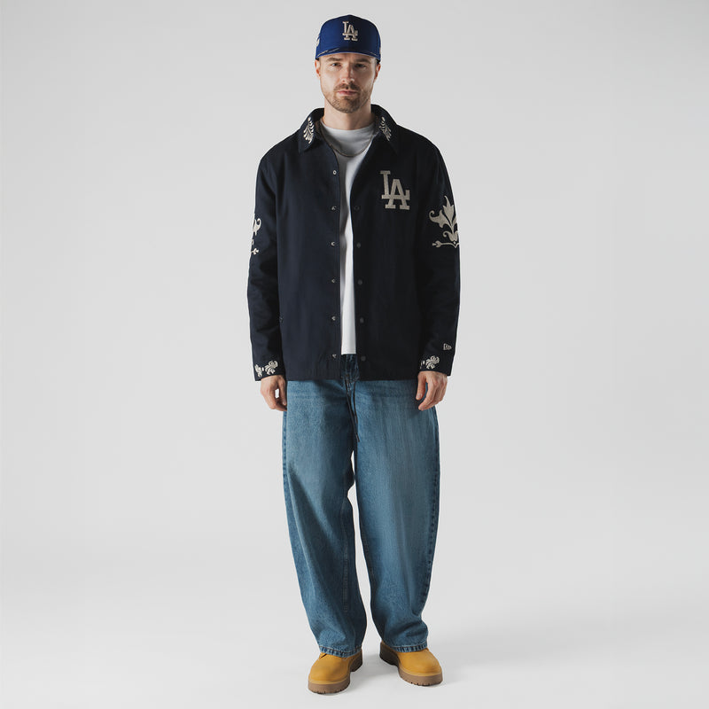 Men's dark navy button-up jacket with LA logo, visible collar and sleeve embroidery