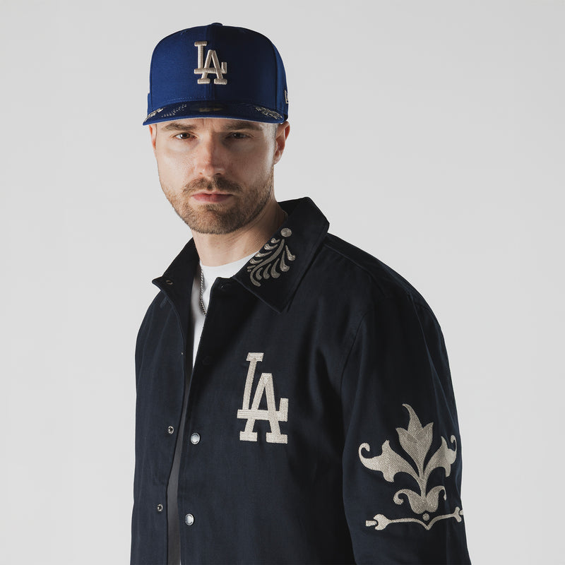 Men's dark navy jacket with chest LA logo and fleur-de-lis style sleeve embroidery