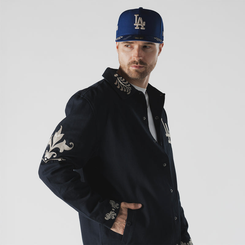 Men's dark navy jacket with embroidered LA logo and ornate sleeve detailing
