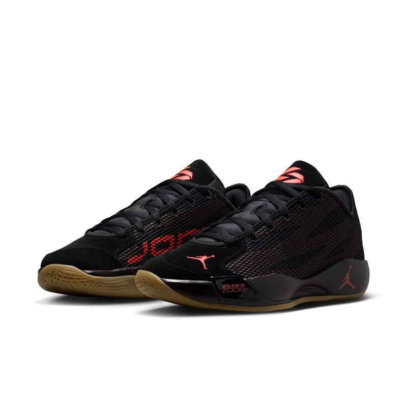 Men's basketball shoes, black knit upper with red stripe detailing and brown sole
