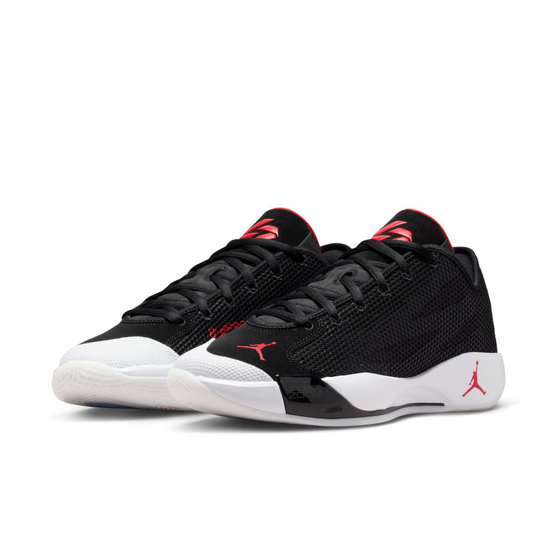 Men's black basketball shoes with red logo, white midsole, lace-up.