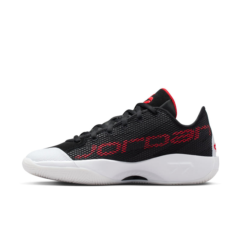 Men's black basketball shoes with red patterned upper and white midsole, lace-up.
