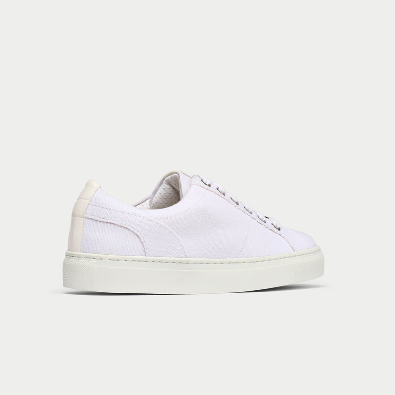 Luna white trainer shoe back/side view