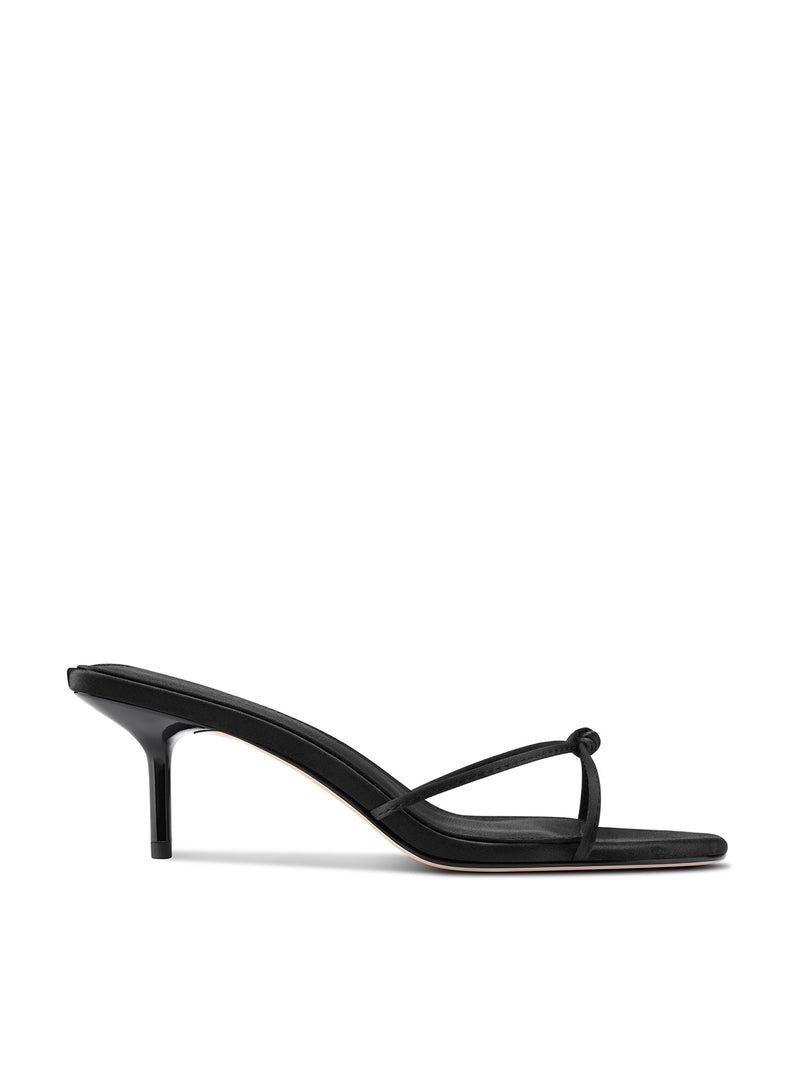 Black satin Maeve Slipper by FEMME LA, side view showing low kitten heel and single knot strap across open toe