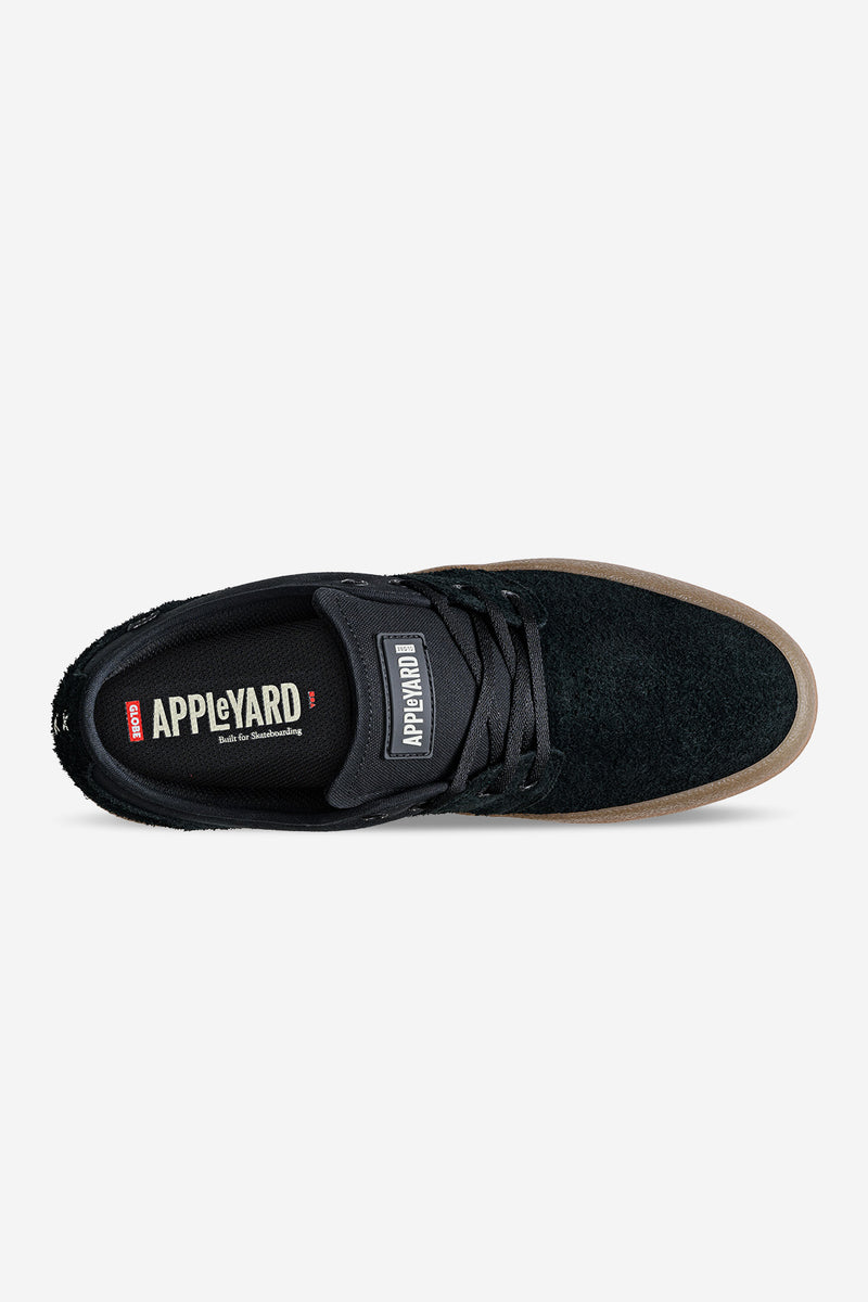 Top view of the Mahalo skate shoe in black with Appleyard branding on the tongue strap