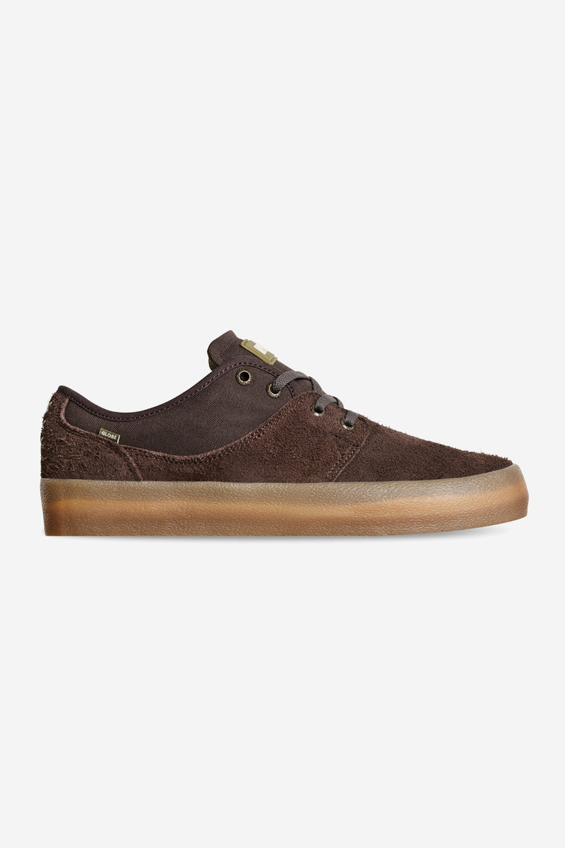 Dark brown Mahalo skate shoe side view with crepe suede upper and gum sole