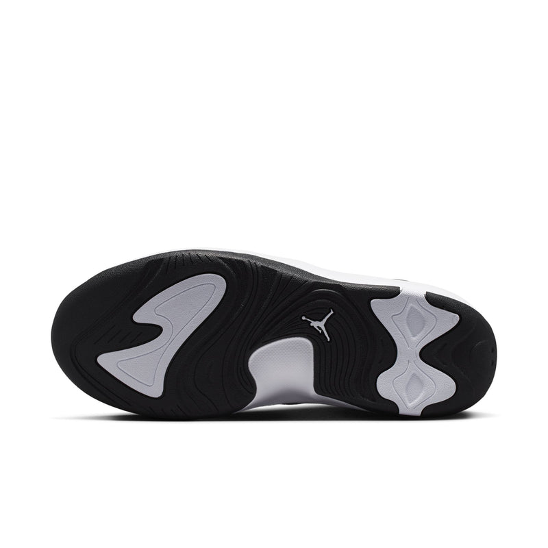 Men's sneakers outsole view, black tread with cool grey and white accents