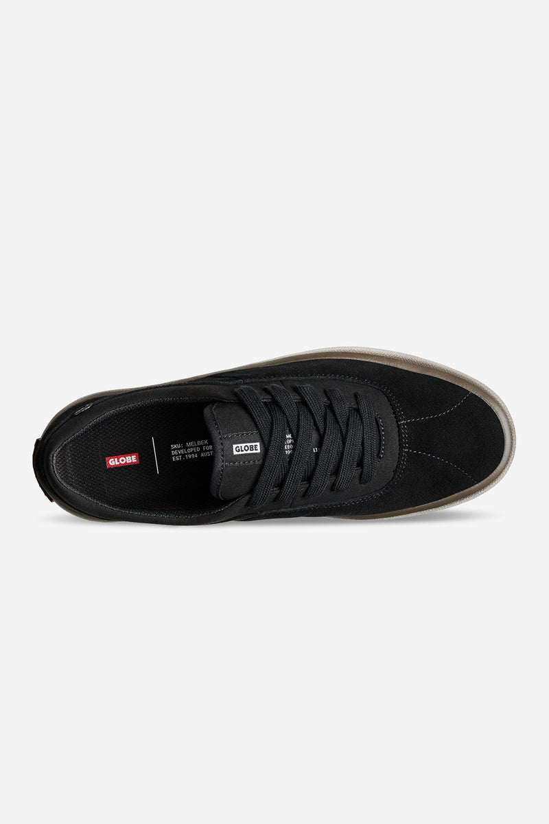 Top view of Melbek black suede skate shoe with lace closure and gum sole