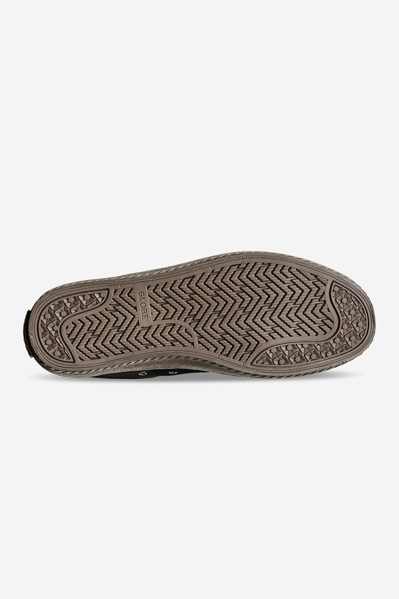 Bottom view of Melbek skate shoe outsole in brown with a herringbone tread and Globe logo.