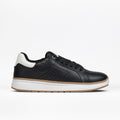 The BILLY Footwear Men's Comfort Luxe in black features black laces, a white cushioned heel tab, white midsole, and light brown outsole for style and comfort. Shown on a plain white background, it suits any occasion.