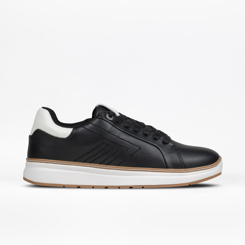 The BILLY Footwear Men's Comfort Luxe in black features black laces, a white cushioned heel tab, white midsole, and light brown outsole for style and comfort. Shown on a plain white background, it suits any occasion.