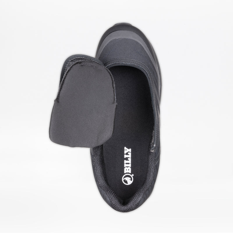 Top view of the Men's Black to the Floor BILLY Goat slip-on orthopedic shoe by BILLY Footwear, featuring a side zipper and foldable upper. The insole displays the “BILLY” logo in white. This AFO-friendly shoe provides comfort and support.