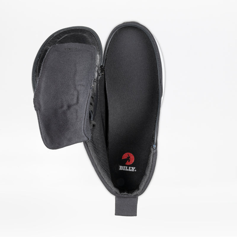 The Men's Black/White BILLY Goat Classic High by BILLY Footwear is shown unzipped to reveal the insole with a red goat logo and "BILLY," designed for orthotics use. Displayed against a plain white background.