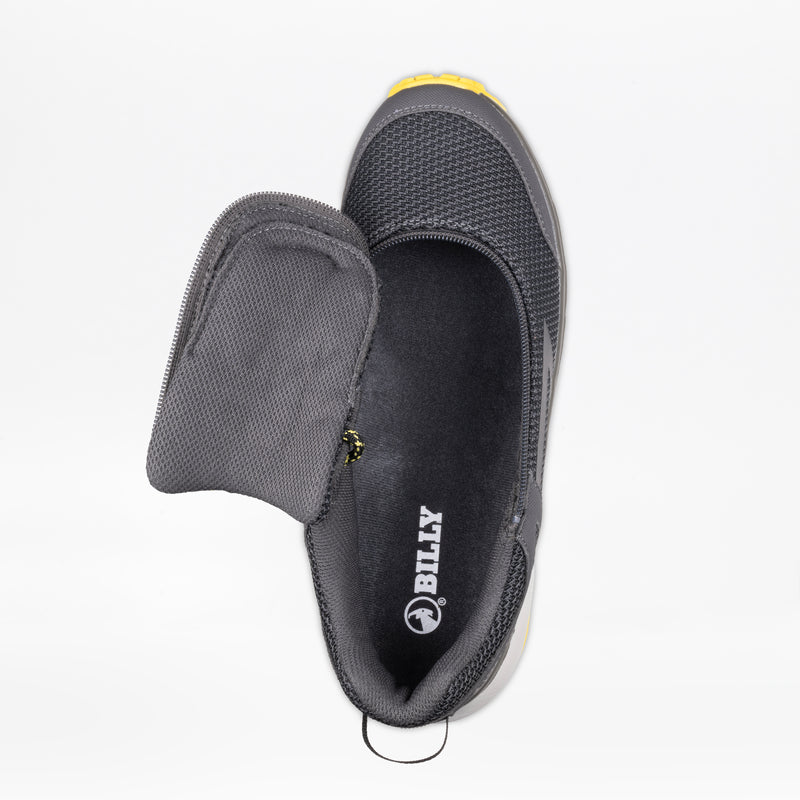 The Men's Charcoal/Yellow BILLY Inclusion Trail by BILLY Footwear features a textured gray upper, easy on/off zipper flap partially open to show the branded insole, yellow accents on the toe, and a hiking-inspired sneaker design.