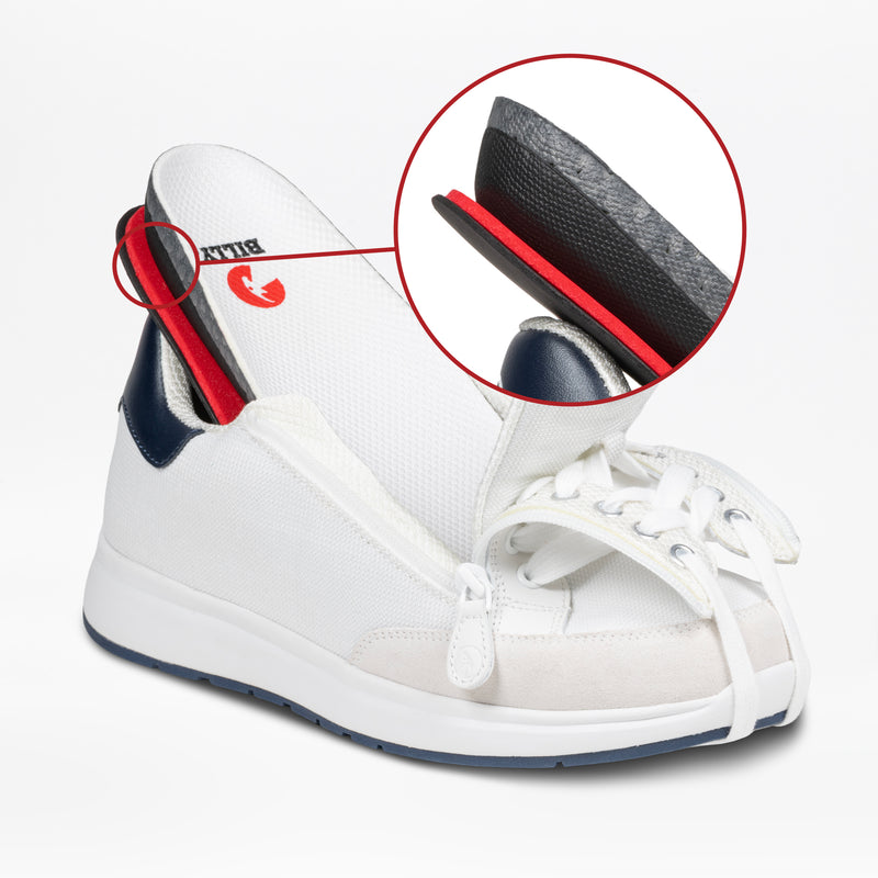 The Men's White/Navy BILLY Comfort Court by BILLY Footwear features a white zipper upper revealing a black and red insole. A circular inset highlights the layered sole construction, showcasing these stylish men’s fashion shoes.