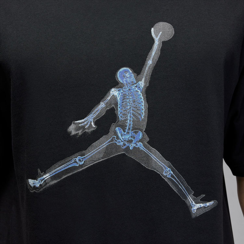 Black T-shirt with close-up light-blue skeleton basketball graphic on chest.