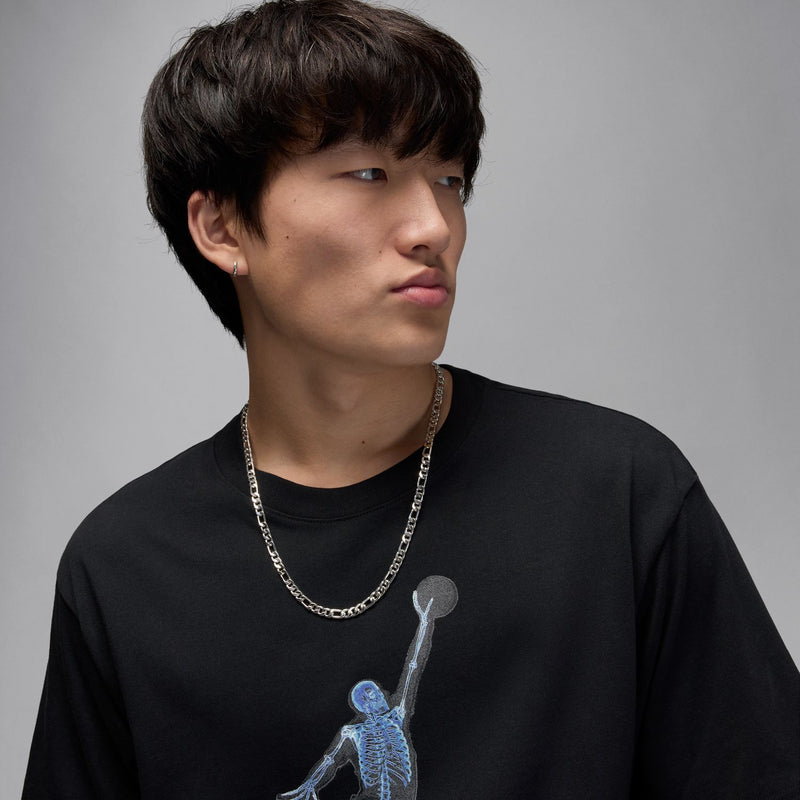 Black crewneck T-shirt with light-blue skeleton basketball print and ribbed collar.