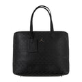 Black monogram tote bag with top handles and front logo patch