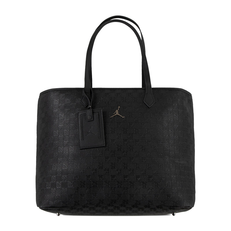Black monogram tote bag with top handles and front logo patch