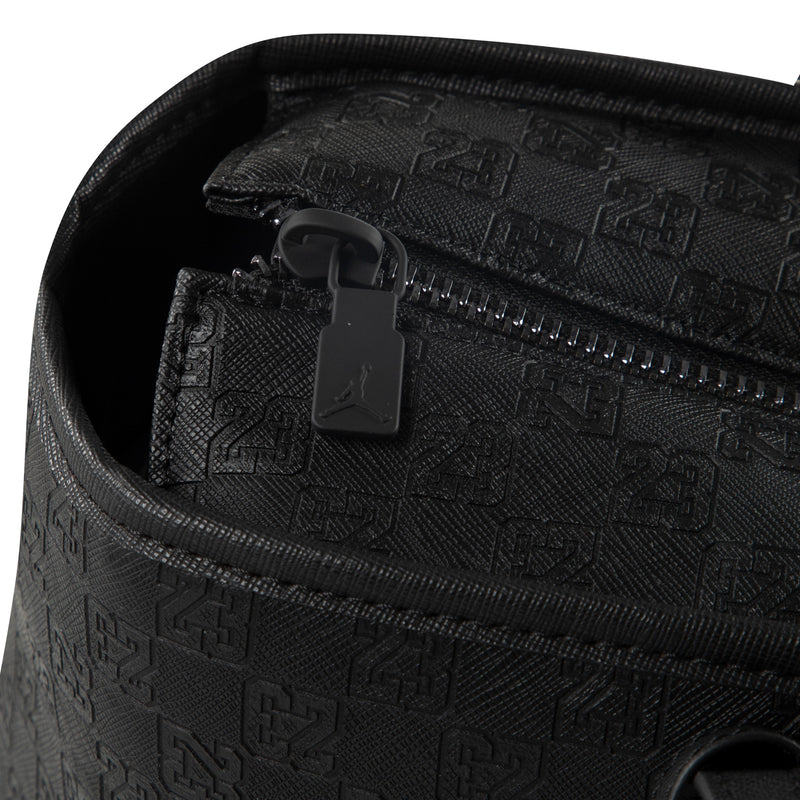 Black monogram tote bag open top with zipper pull and hanging tag