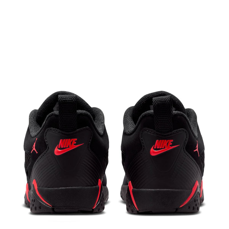 Kids black sneakers heel view with red Nike branding and Jumpman logos