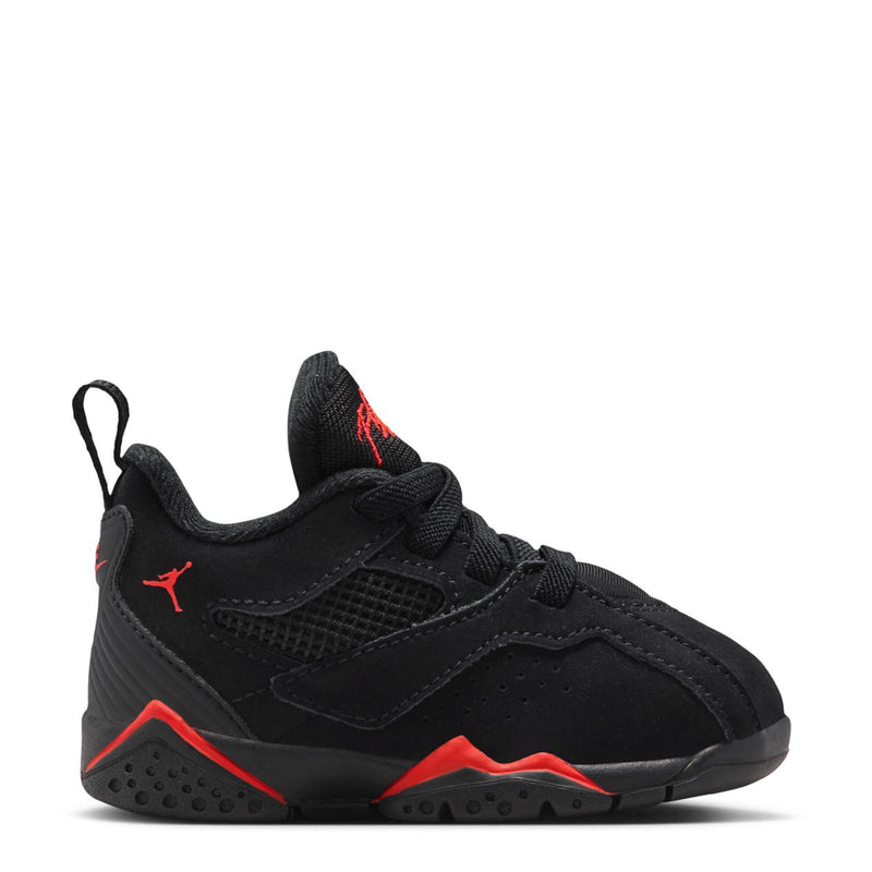 Kids black low-top sneakers with red laces and red outsole accents