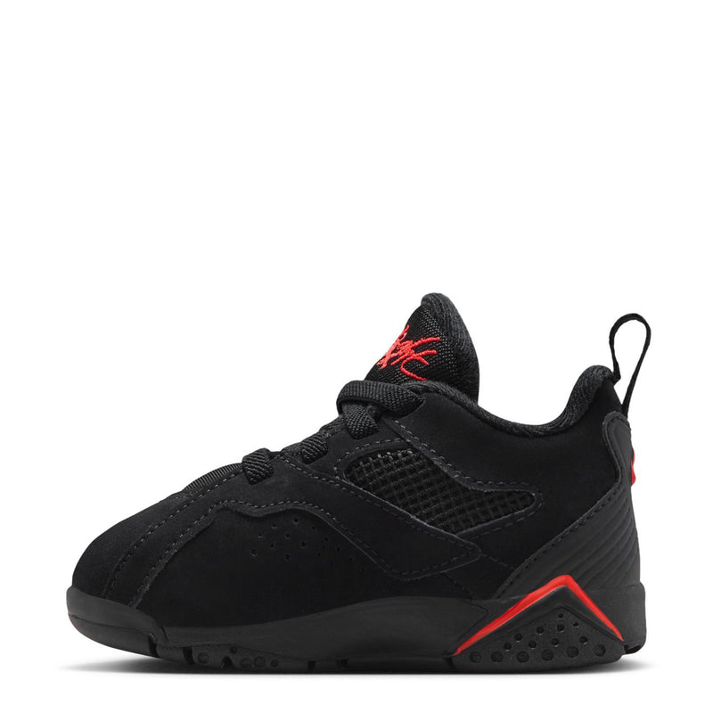 Kids black low-top sneakers with red trim, lace-up front, and side Jumpman logo
