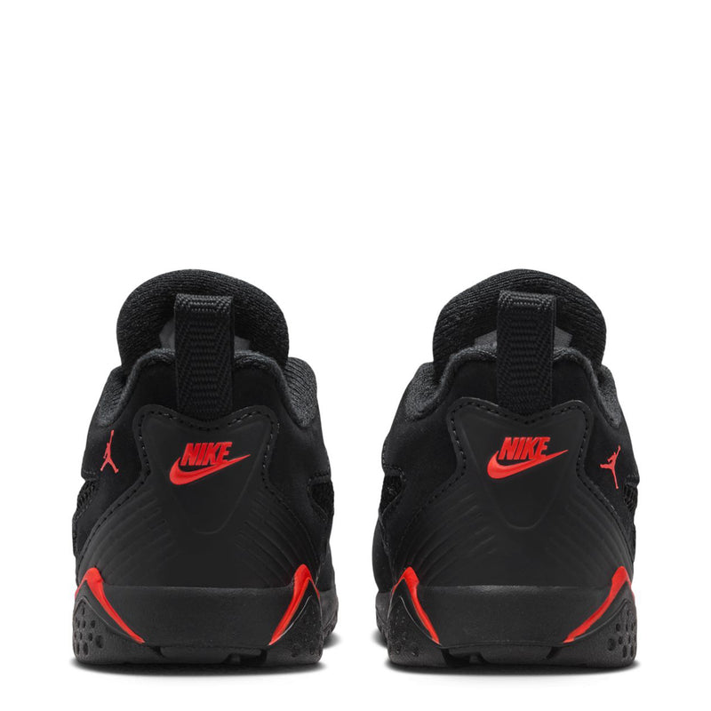 Kids black sneakers with Nike and Jumpman logos on back, red heel accents