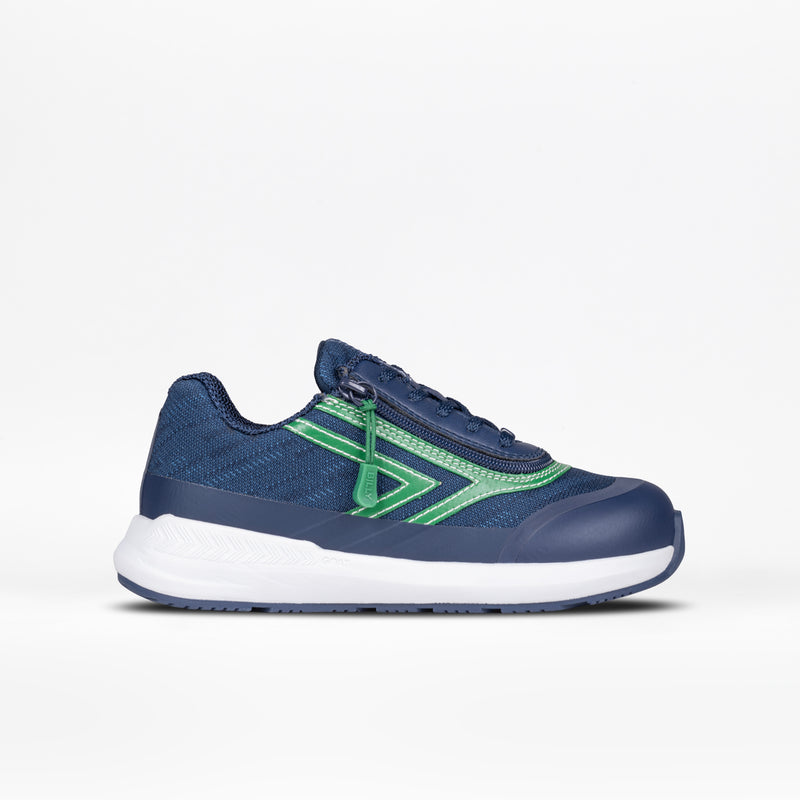 The Navy/Green BILLY Goat by BILLY Footwear is an AFO-friendly athletic shoe with green accents, a white sole, textured pattern, lace-up design, and slightly raised heel, shown on a plain white background.