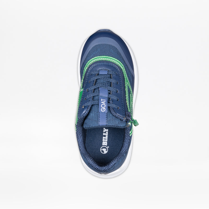 A top view of the Navy/Green BILLY Goat kids’ shoe by BILLY Footwear, featuring a side zipper for AFO-friendly easy access, “BILLY” on the insole, and “GOAT” on the tongue, shown against a plain white background.