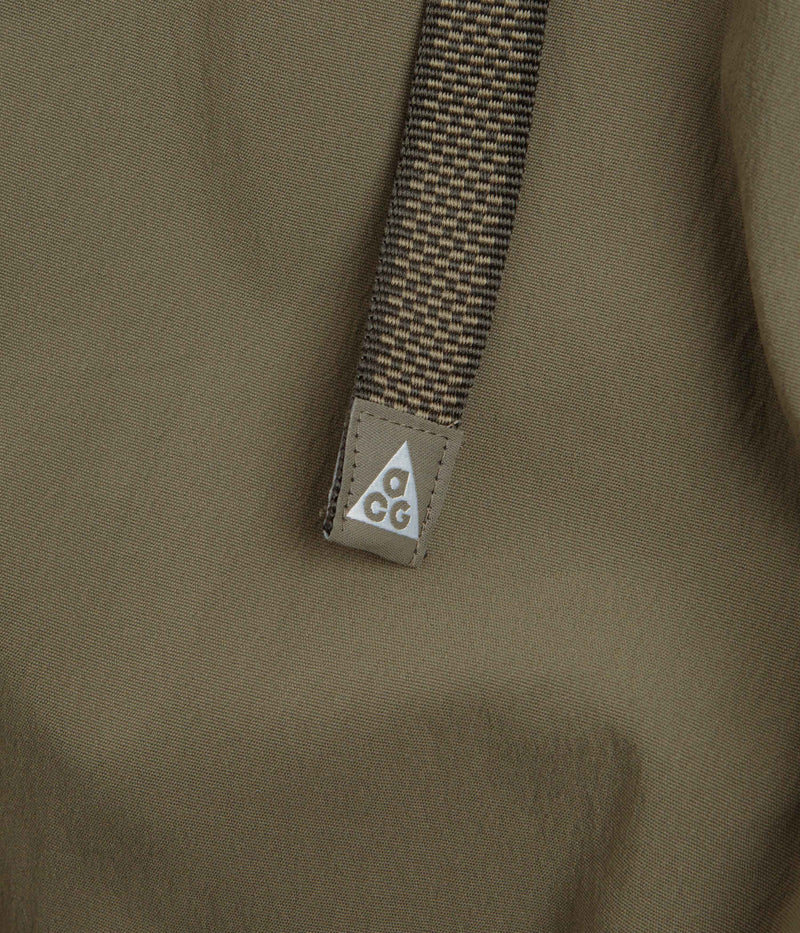 Nike ACG Hiking Pants in Medium Olive and Sequoia / Summit White