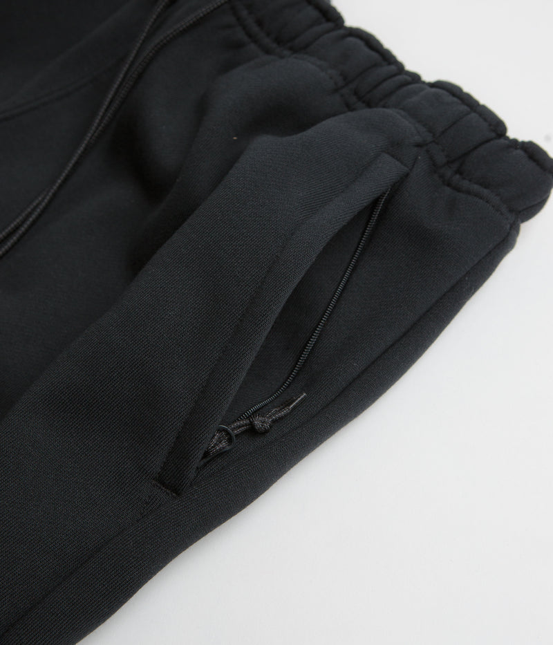 Nike ACG Tuff Fleece Triangle Pants in Black and Summit White