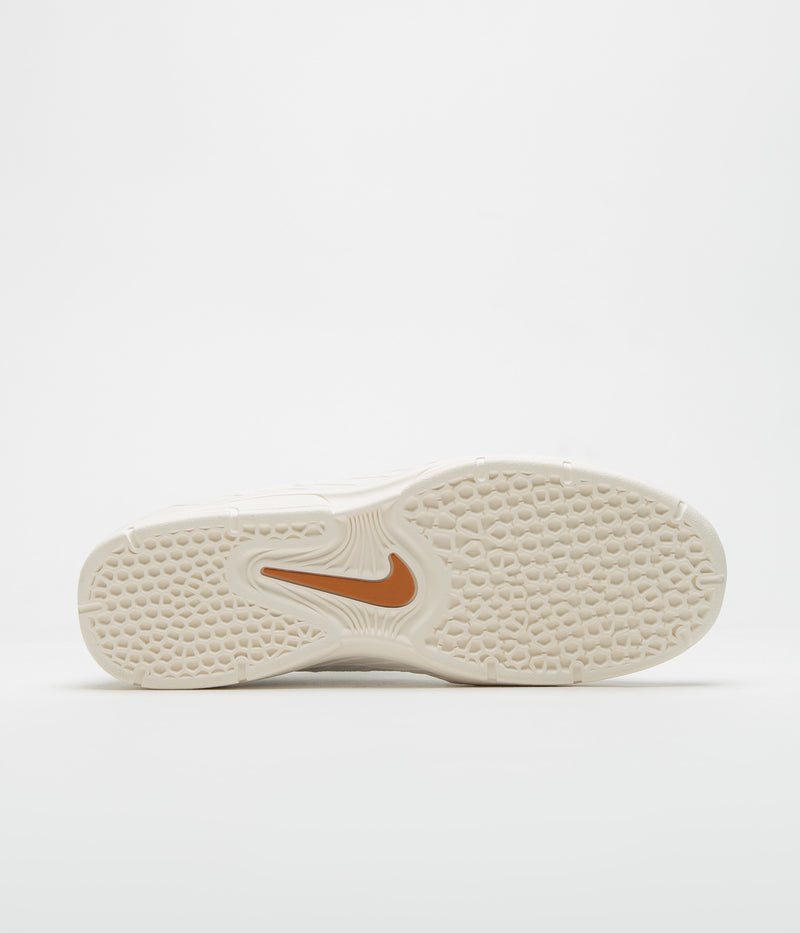 Nike SB Vertebrae Shoes in Summit White and Monarch and Phantom