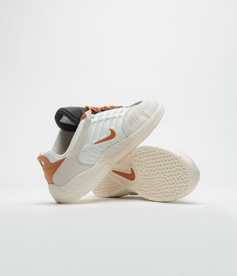 Nike SB Vertebrae Shoes in Summit White and Monarch and Phantom