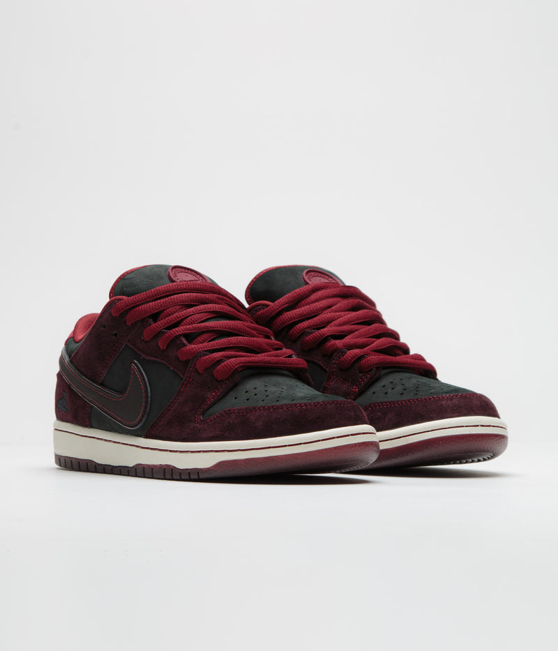Nike SB x RIOT Skateshop Dunk Low Pro Shoes in Mahogany and Dark Beetroot and Team Red - Sail