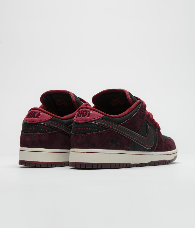 Nike SB x RIOT Skateshop Dunk Low Pro Shoes in Mahogany and Dark Beetroot and Team Red - Sail