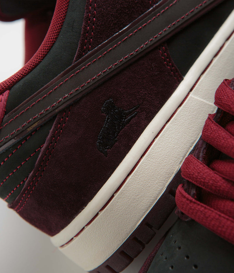 Nike SB x RIOT Skateshop Dunk Low Pro Shoes in Mahogany and Dark Beetroot and Team Red - Sail