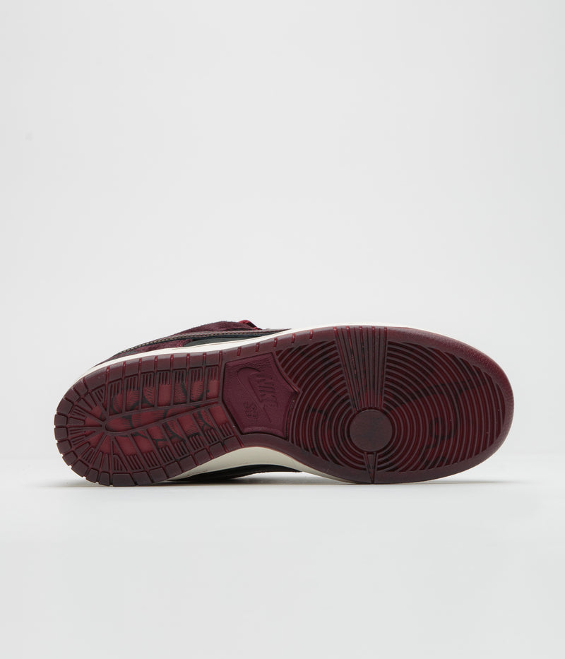 Nike SB x RIOT Skateshop Dunk Low Pro Shoes in Mahogany and Dark Beetroot and Team Red - Sail